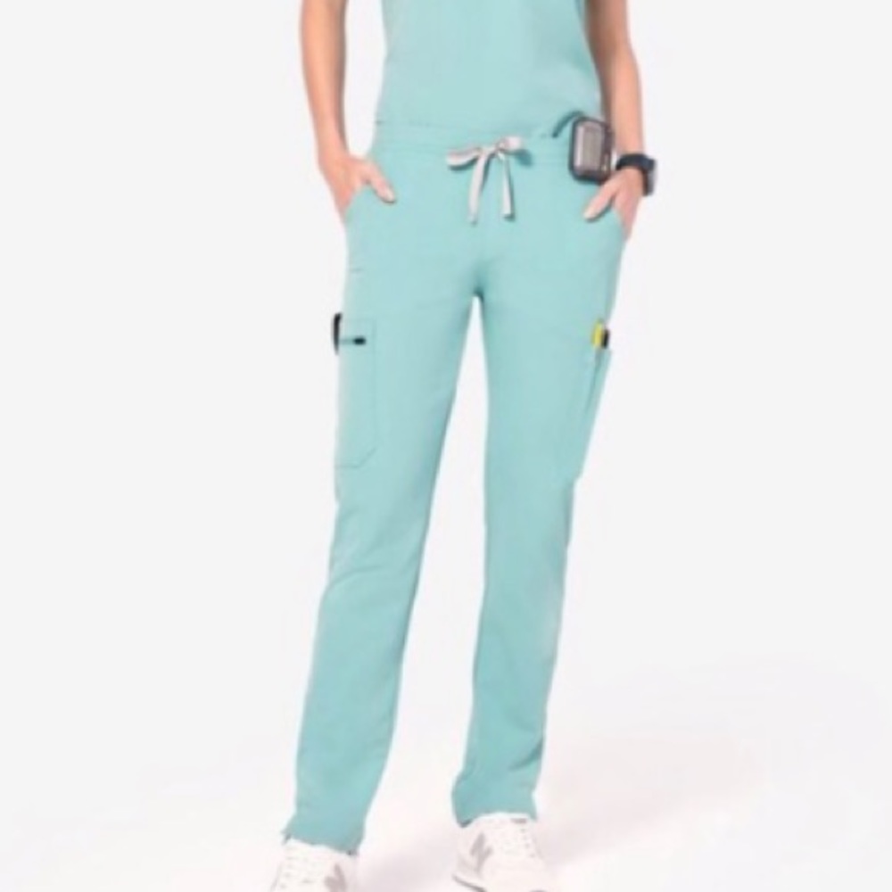Selling xxs Seaglass limited edition, tiny bleach stain on the scrub top.